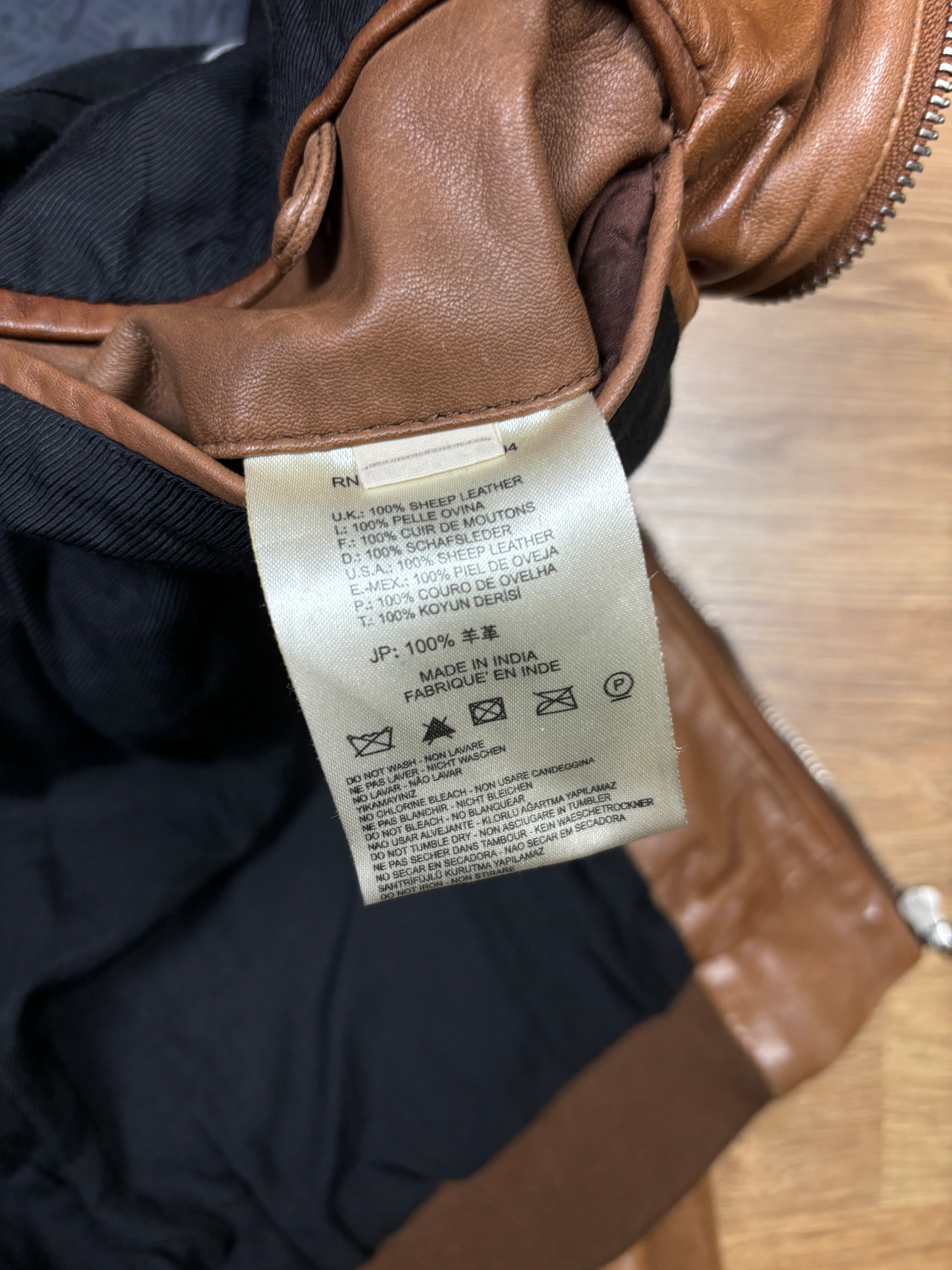 Chaqueta de cuero con capucha Diesel Black Gold y parches de estrellas marrones