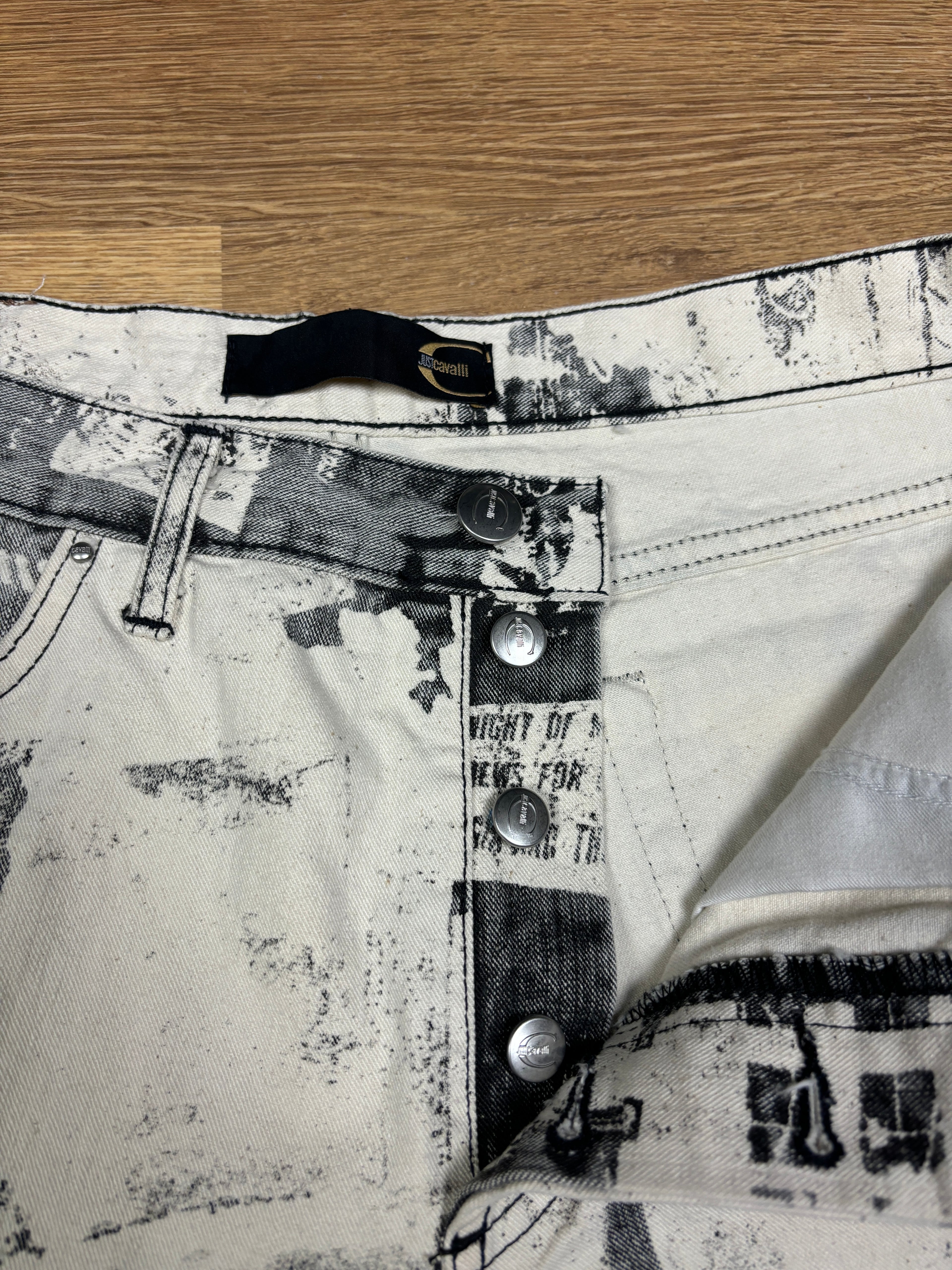 2000s Just Cavalli Newspaper Print Flared Denim Jeans