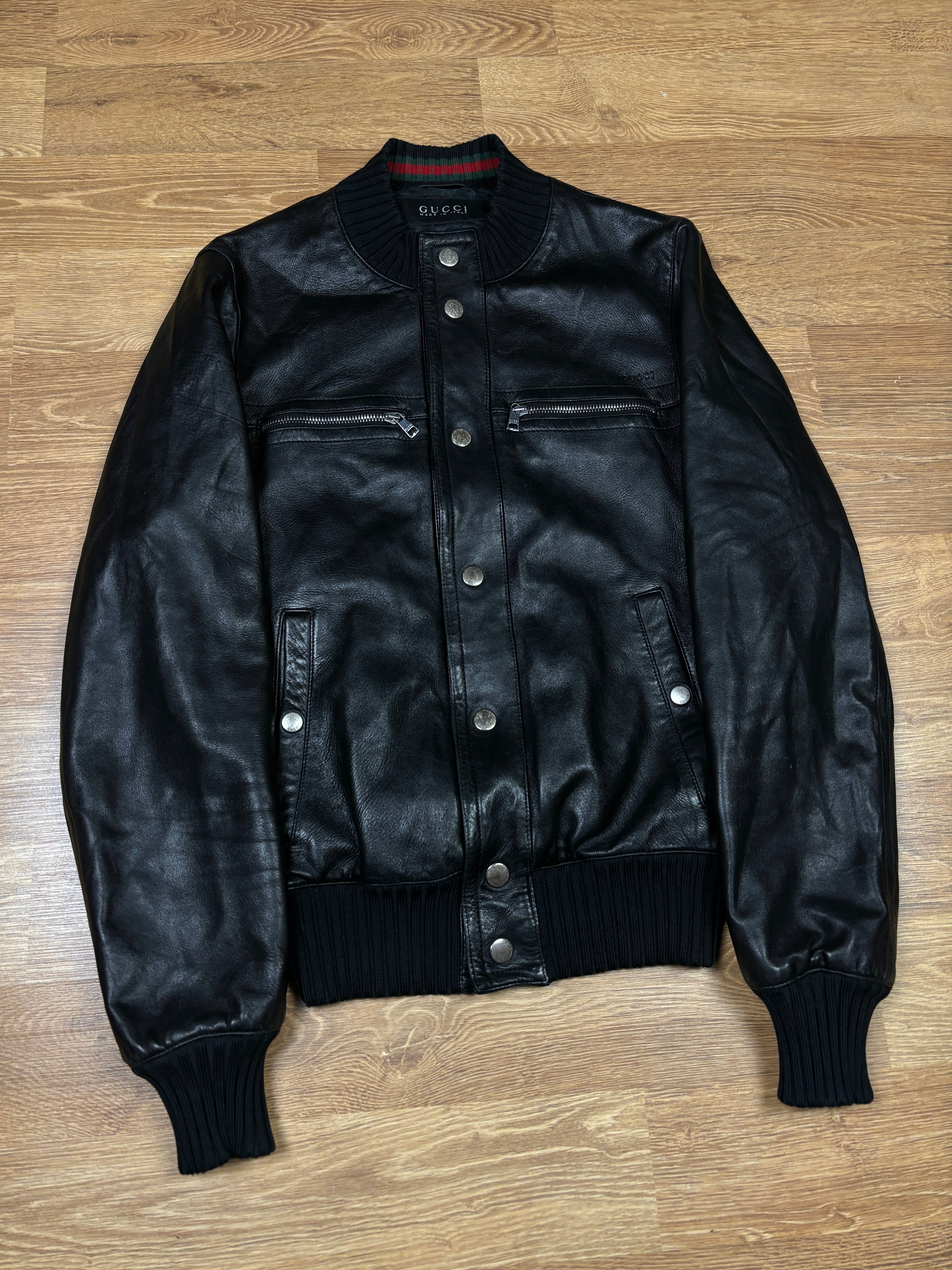 Chaqueta bomber de piel con franja web de Gucci de los 2000