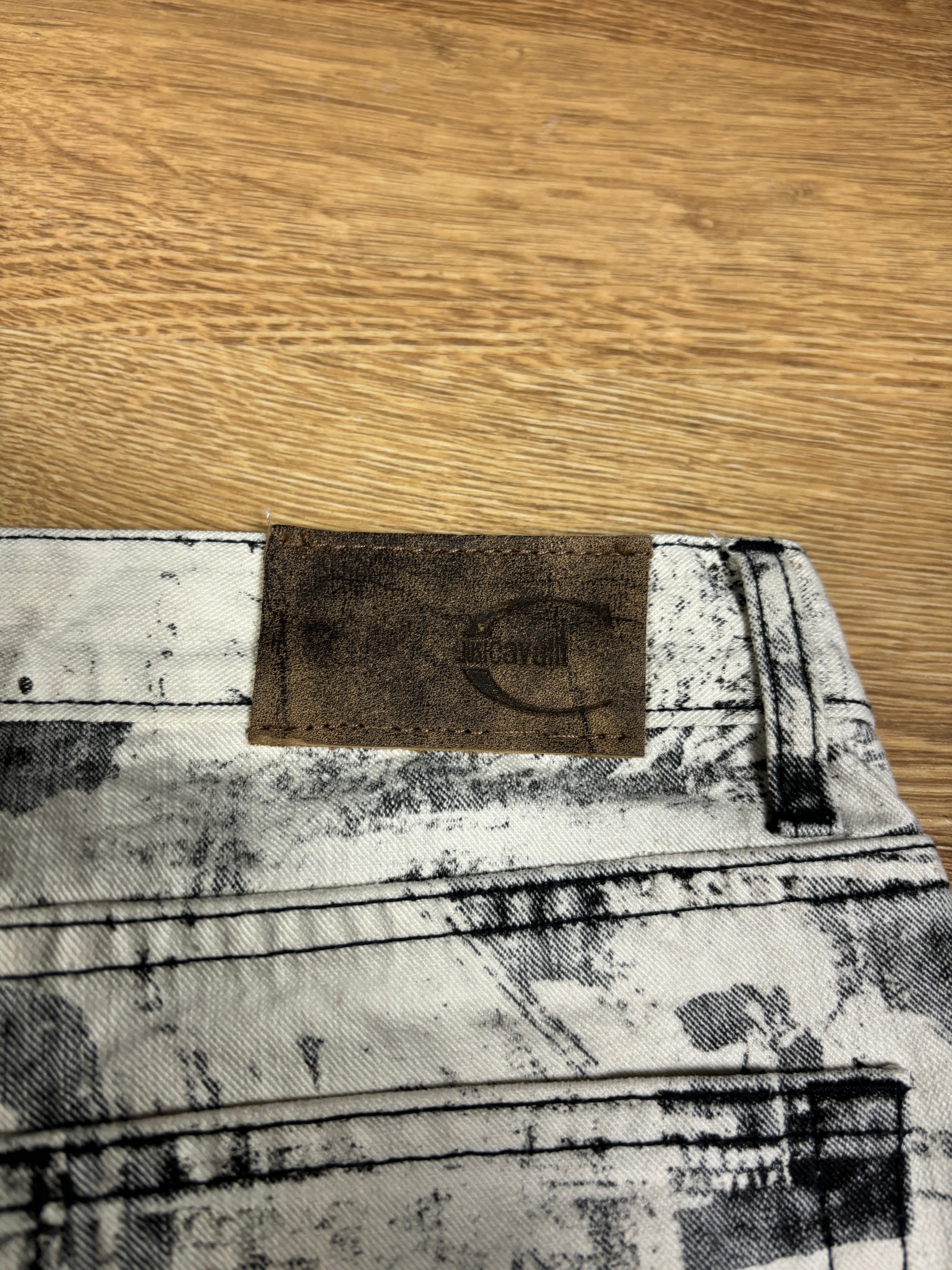 2000s Just Cavalli Newspaper Print Flared Denim Jeans