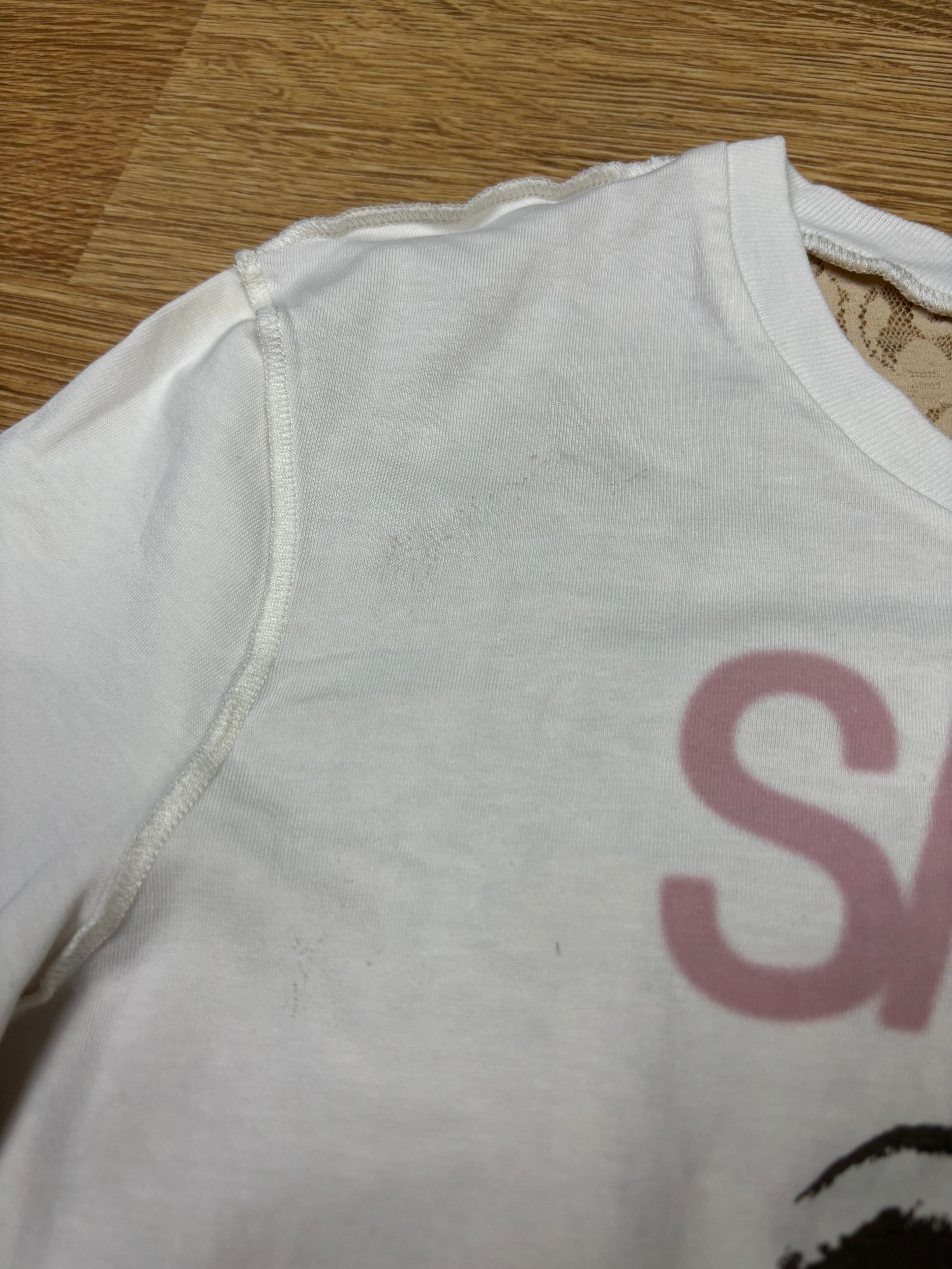 Camiseta Dolce & Gabbana "¡Sálvame!" con encaje en la espalda